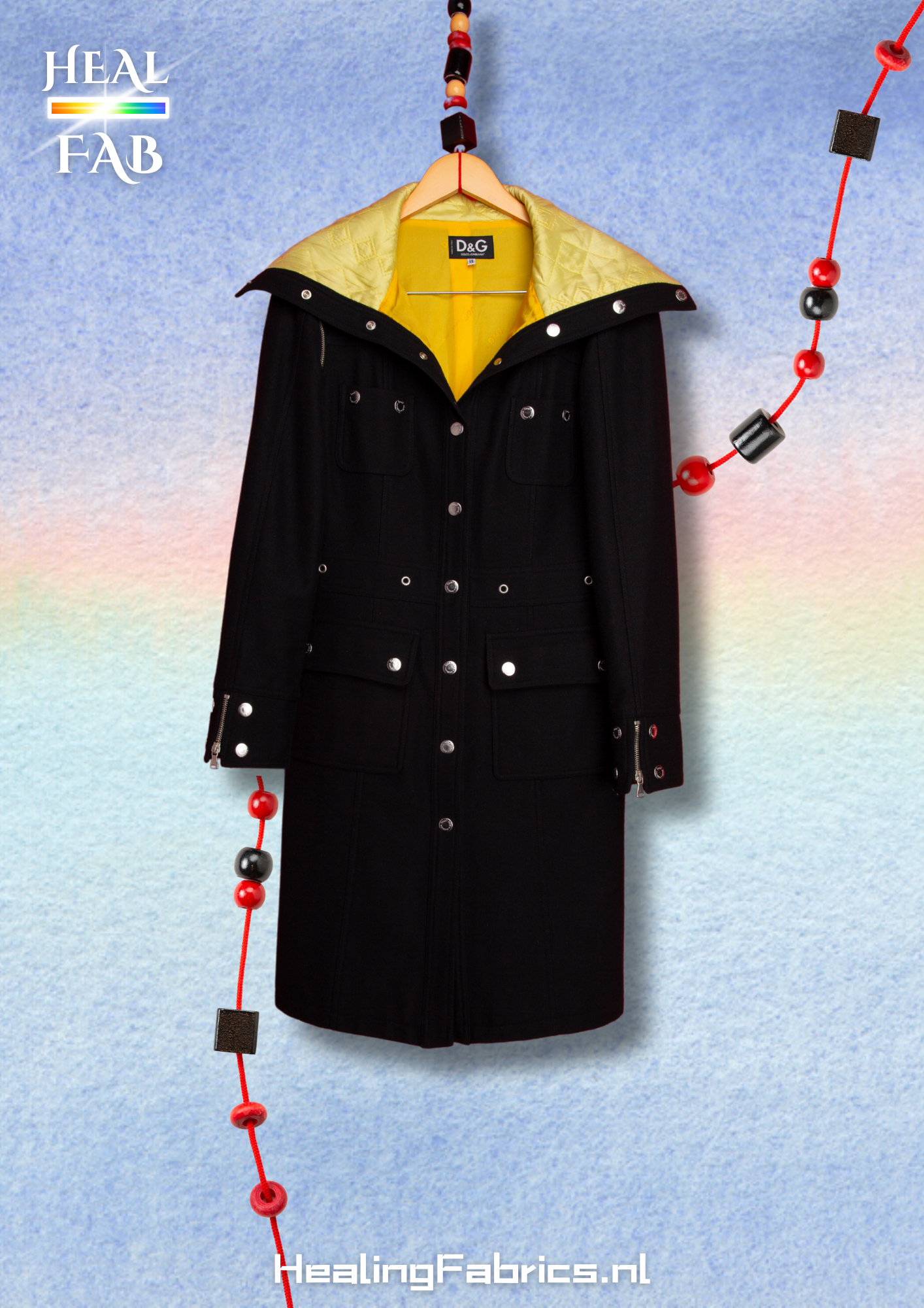 The Dolce & Gabbana black yellow collar coat with adjustable sleeves and silver details