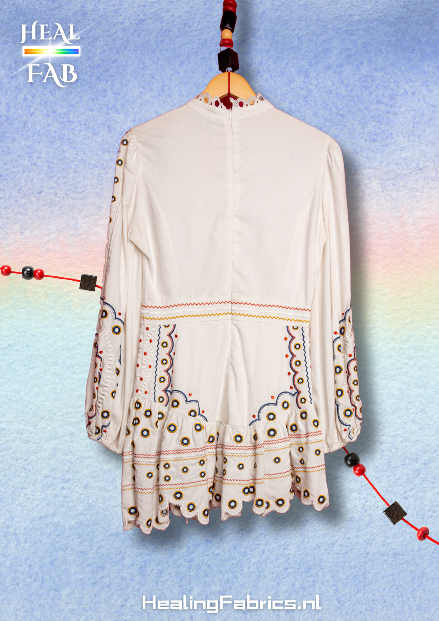 The white lilly dress with multicolor embroidery