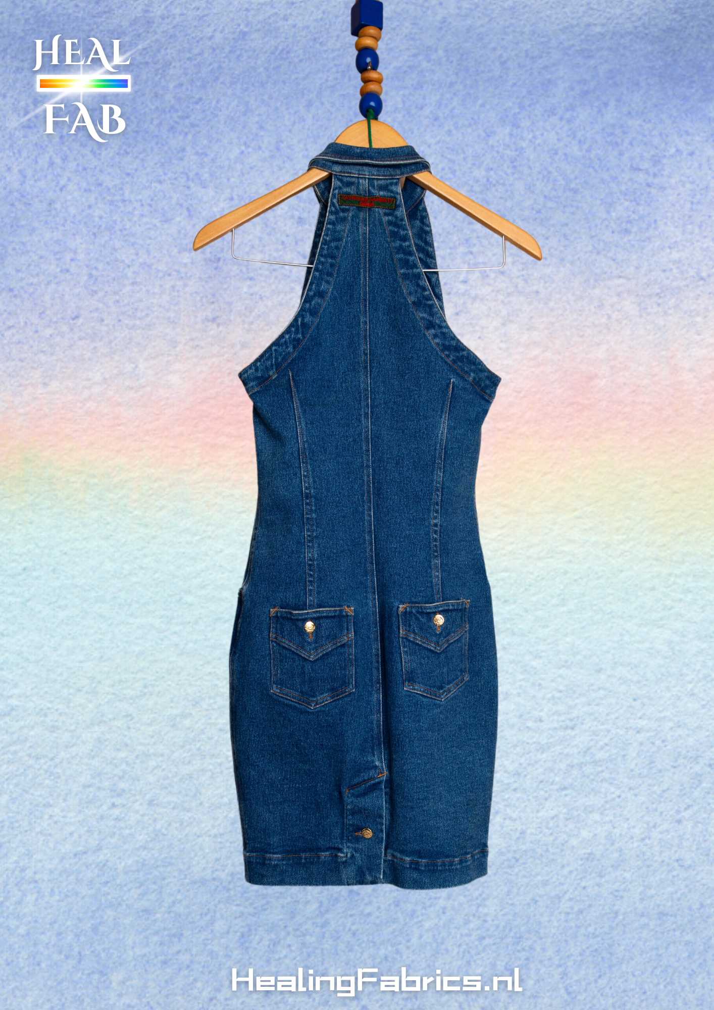 Sleeveless denim dress with multi pockets and gold buttons