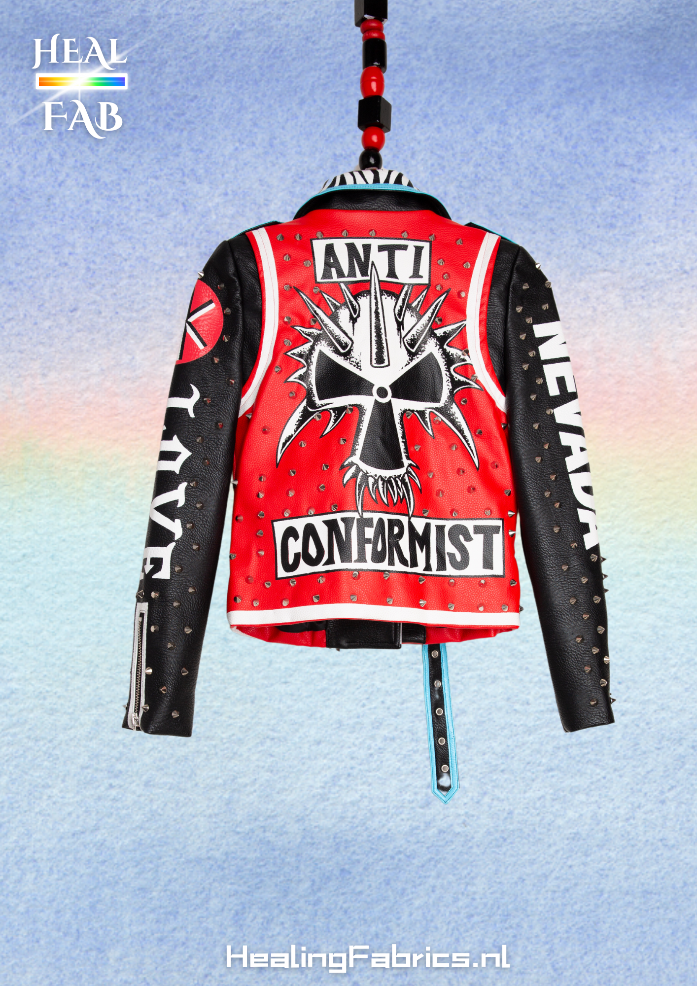 The Protestor faux leather motor jacket - with graffi print, silver studs & adjustble belt