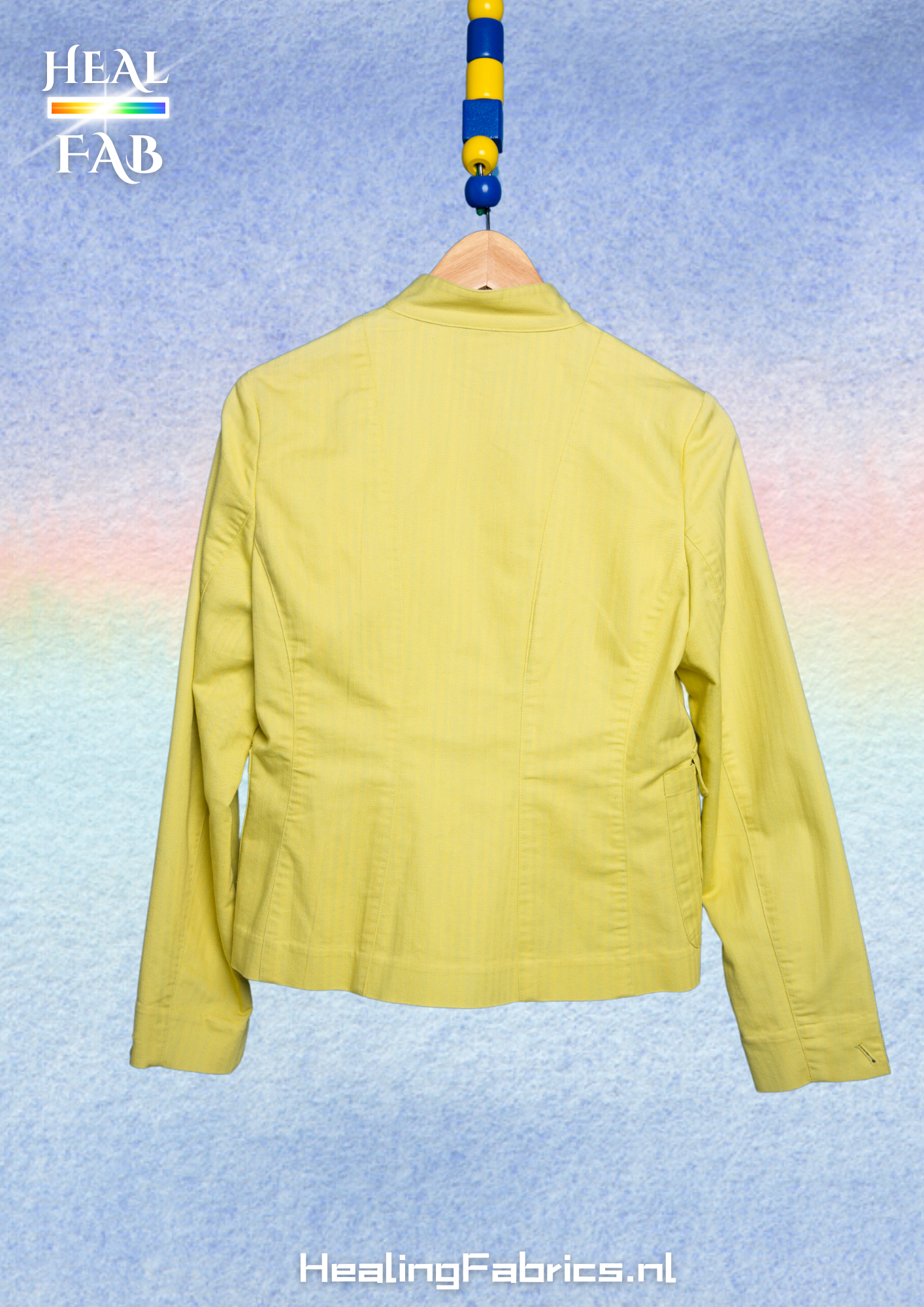 The asymmetric button blazer in lime green with silver detials