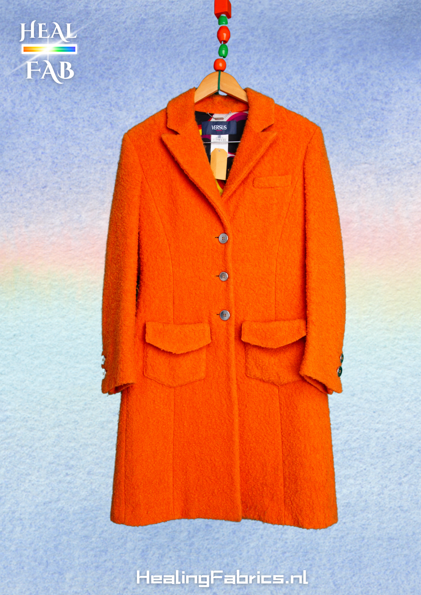 The fruity orange coat - Versace, with textured fabric and silver button detials