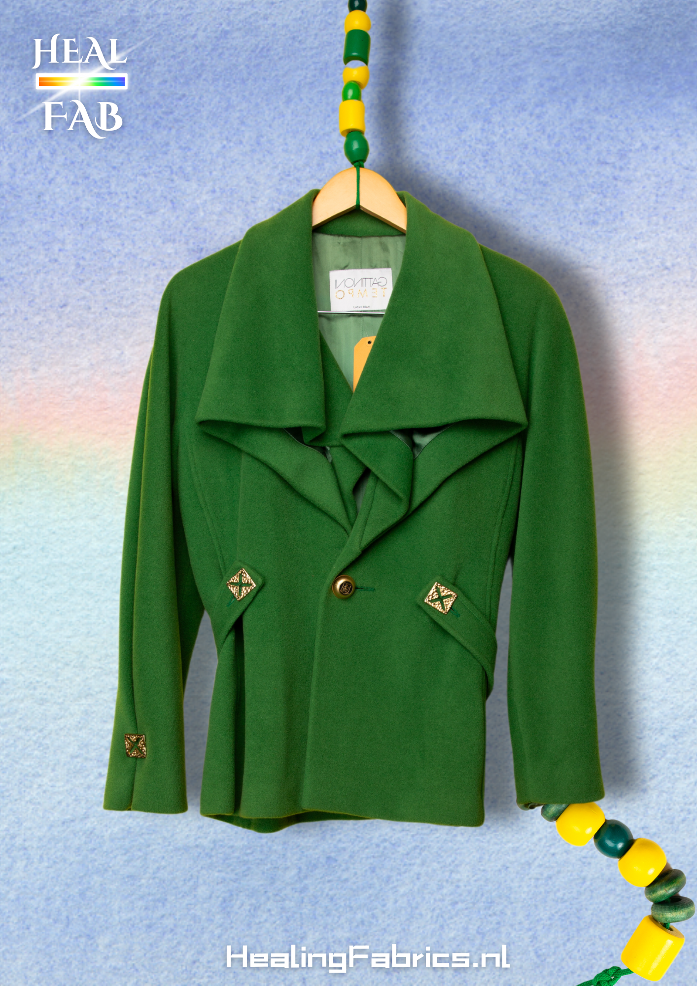 The Scarf-holder coat in moss green with gold details