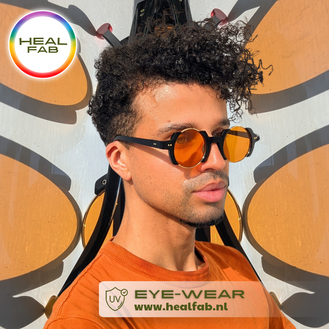 The Soulful Signature sunglasses with circular shaped orange vision & gold details