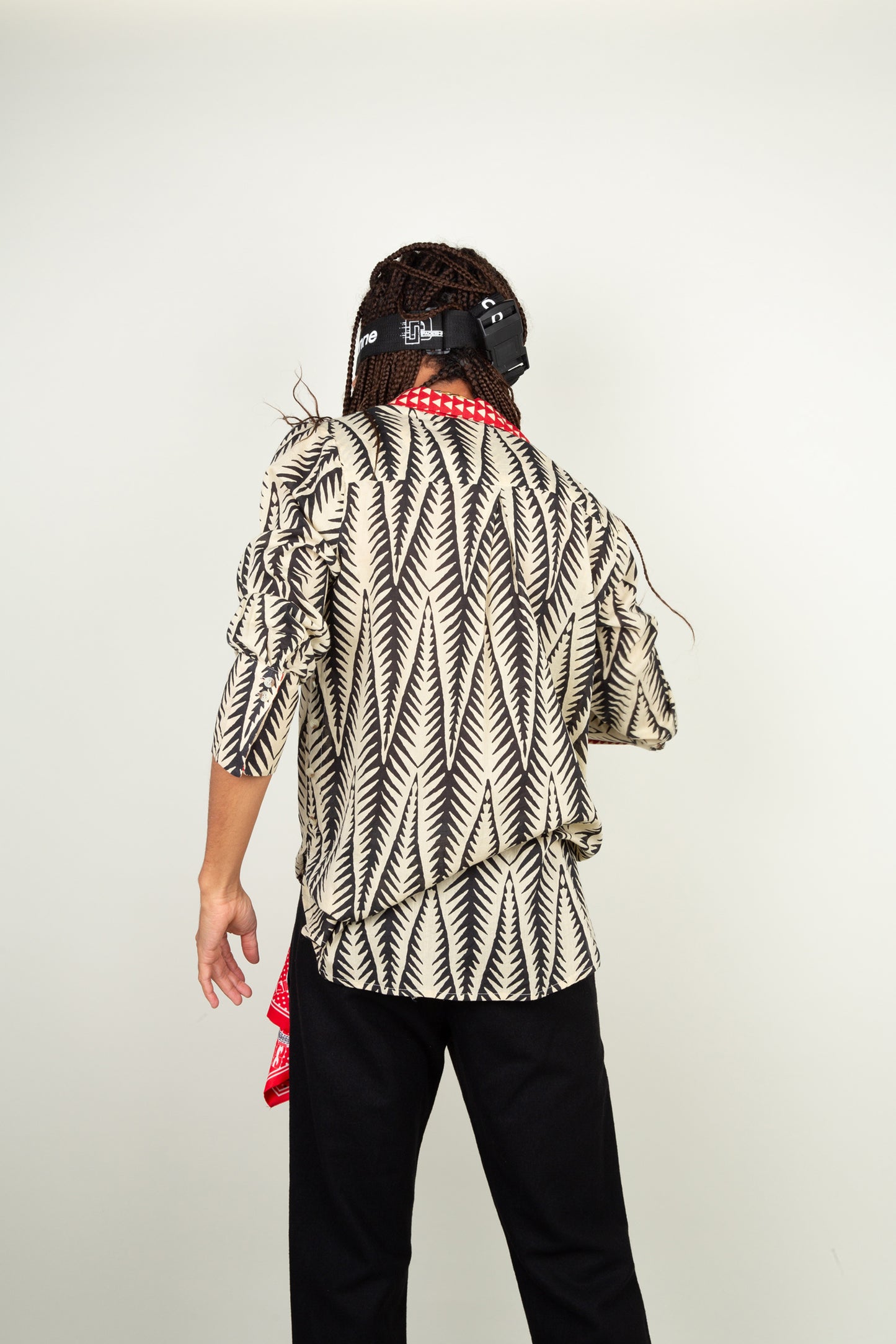 Tribal feather blouse in black and off white with red collar