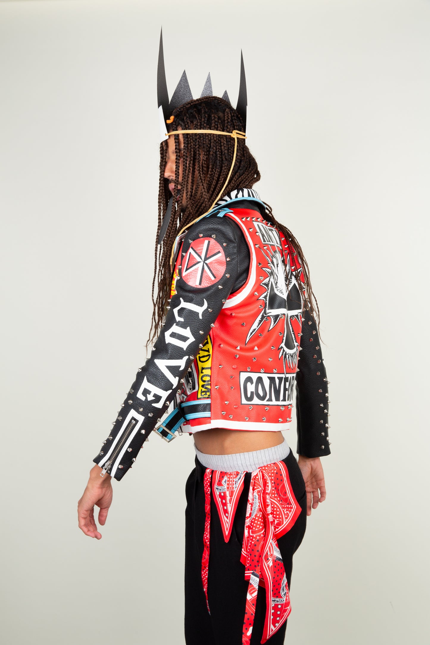 The Protestor faux leather motor jacket - with graffi print, silver studs & adjustble belt