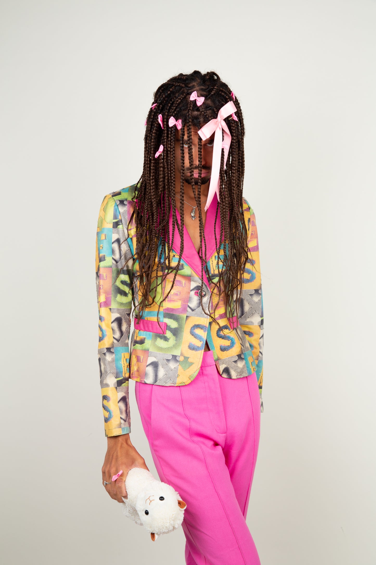 The retro S-E-X print jacket in multicolors and hint of pink fuchsia