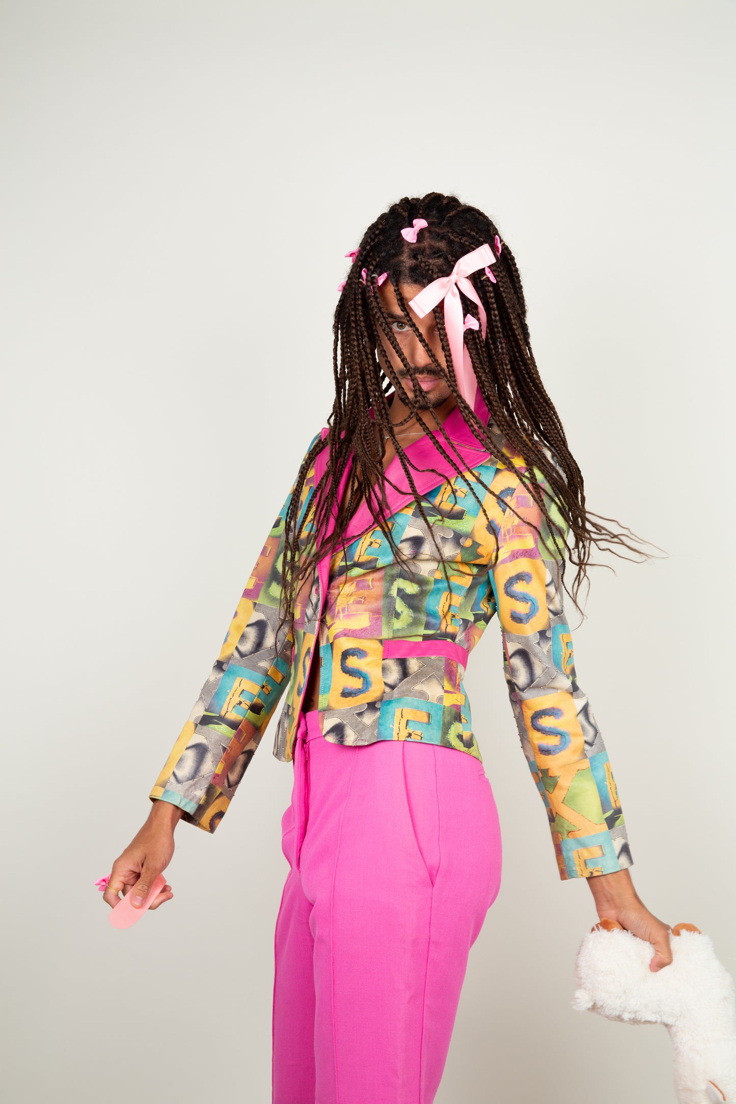 The retro S-E-X print jacket in multicolors and hint of pink fuchsia