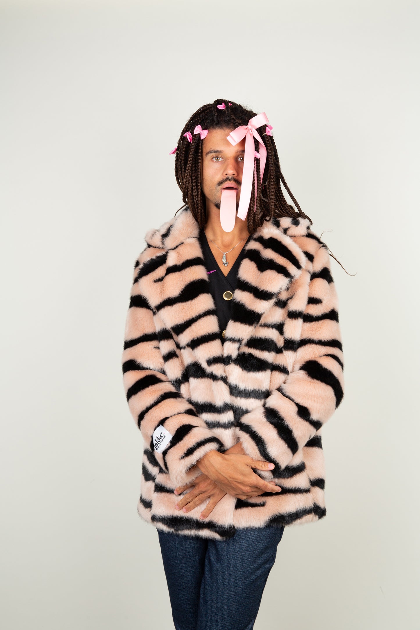The Faux Tiger Striped coat in black and light pink tints