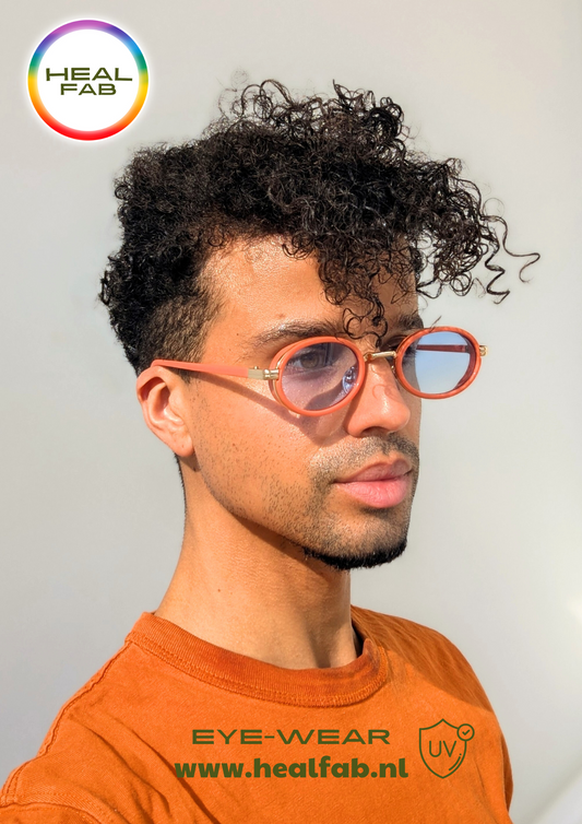 The Coral Classic sunglasses with oval shaped blue vision & gold details