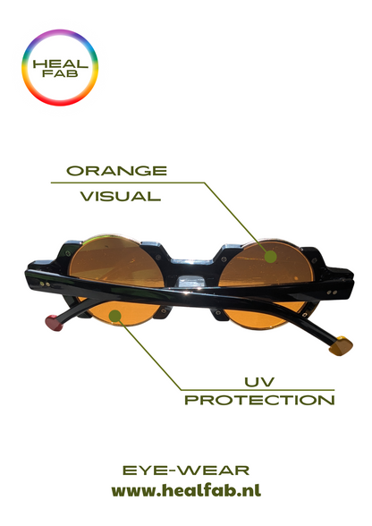 The Soulful Signature sunglasses with circular shaped orange vision & gold details