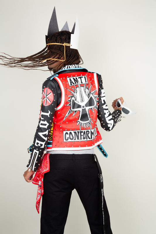 The Protestor faux leather motor jacket - with graffi print, silver studs & adjustble belt