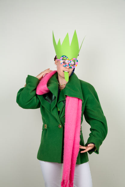 The Scarf-holder coat in moss green with gold details