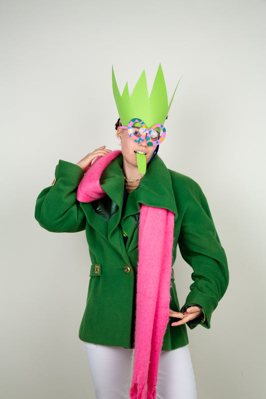 The Scarf-holder coat in moss green with gold details