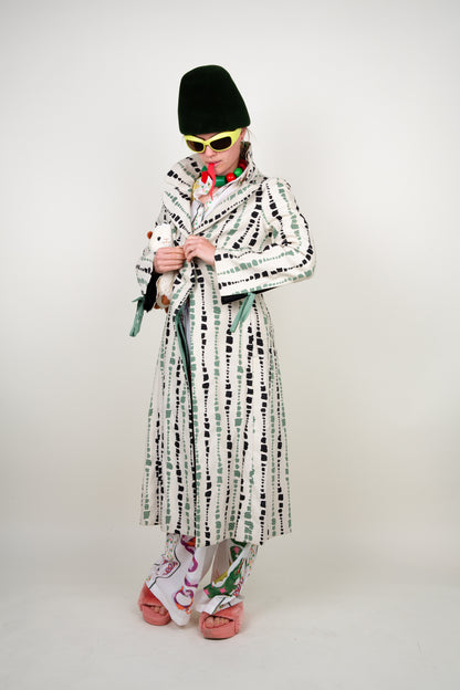 The artist coat in white, green and black