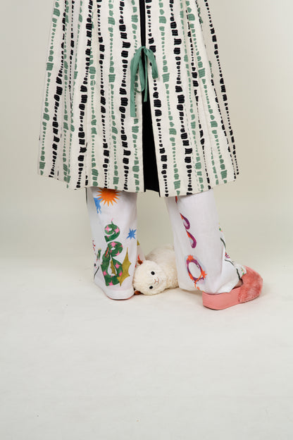 The artist coat in white, green and black