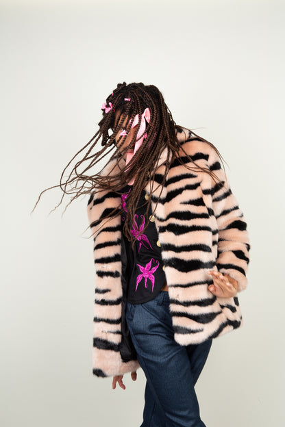 The Faux Tiger Striped coat in black and light pink tints